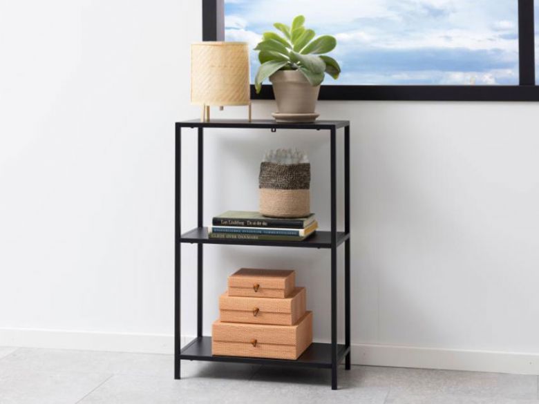 Onyx industrial black metal console table available at Furniture Barn